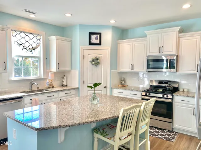 a workspace with furniture and a window