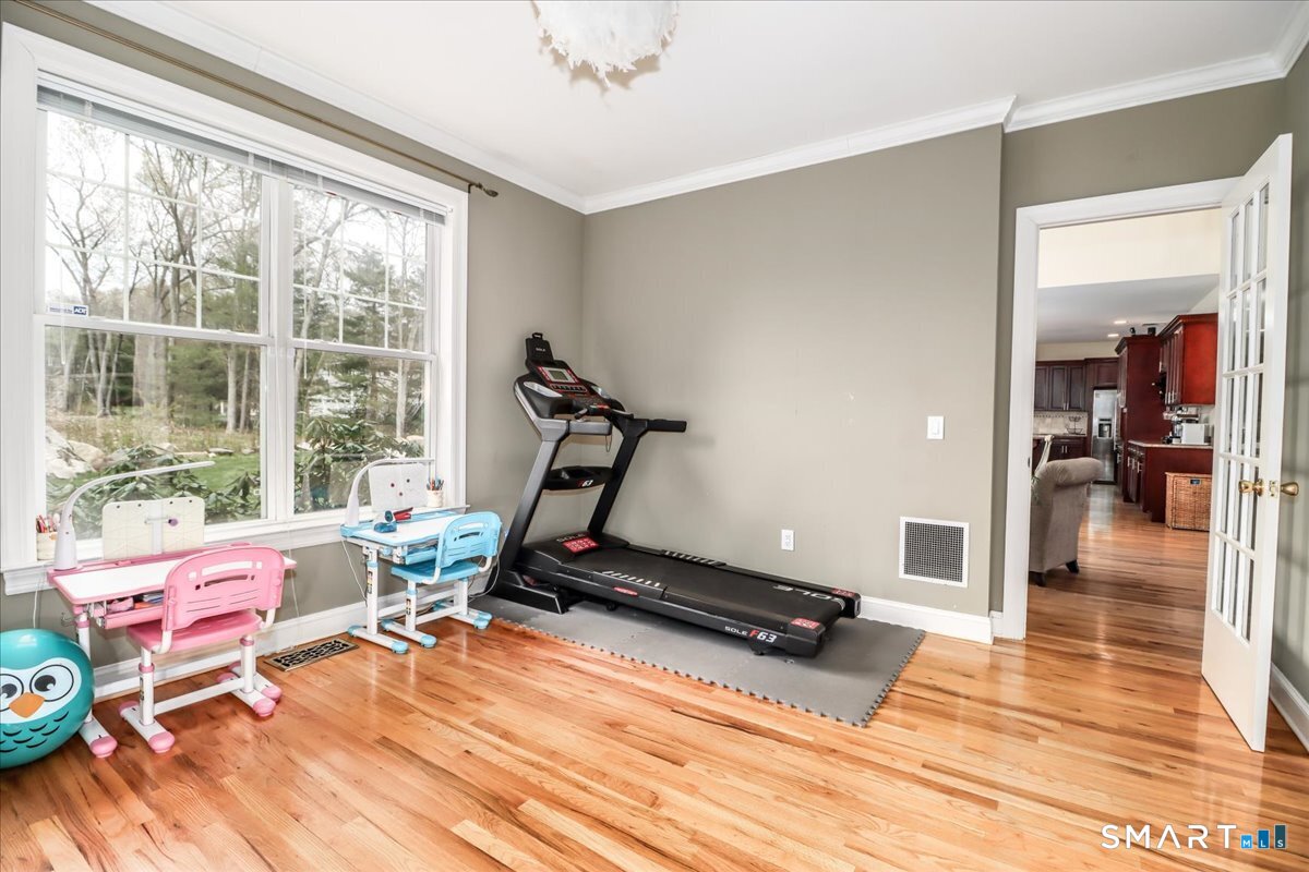 21 Pearl Street Newtown, CT 06482 - Photo 12 of 39 a view of a room with gym equipment