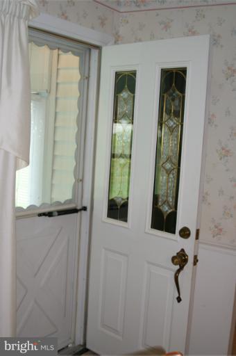 226 Burning Tree Road Lutherville-Timonium, MD 21093 - Photo 14 of 19 Exterior door to rear sunroom