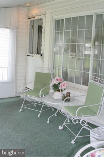 226 Burning Tree Road Lutherville-Timonium, MD 21093 - Photo 15 of 19 Rear enclosed sunporch