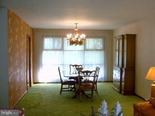 1215 Meinel Road Huntingdon Valley, PA 19006 - Photo 3 of 6 a view of a dining room with furniture and chandelier
