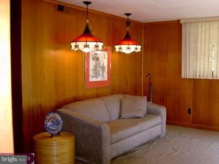 1215 Meinel Road Huntingdon Valley, PA 19006 - Photo 5 of 6 a living room with furniture and a window