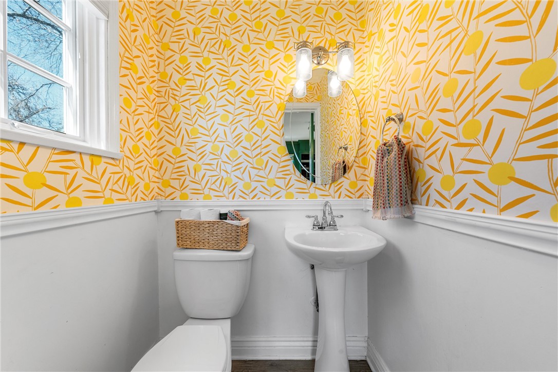 2737 Cumberland Avenue Waco, TX 76708 - Photo 21 of 45 a bathroom with a sink and mirror with toilet