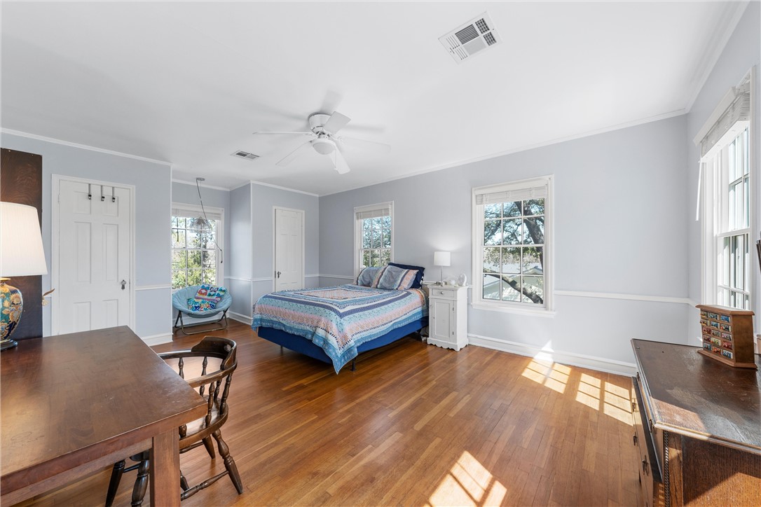 2737 Cumberland Avenue Waco, TX 76708 - Photo 31 of 45 a bedroom with a bed and a table in it