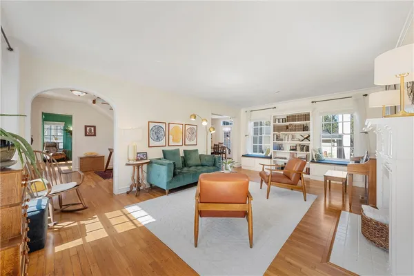 a living room with furniture and a rug