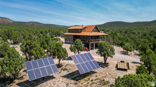 View from above of property featuring a mountainous background