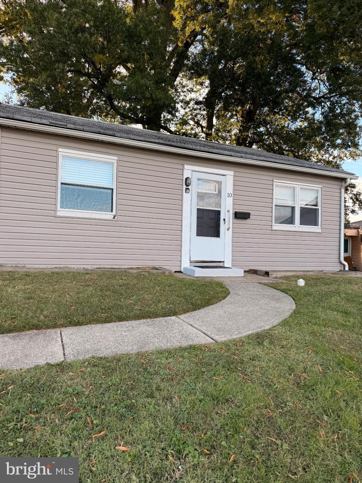 10 Compass Road Baltimore, MD 21220 - Photo 2 of 15 a backyard of a house with lots of green space