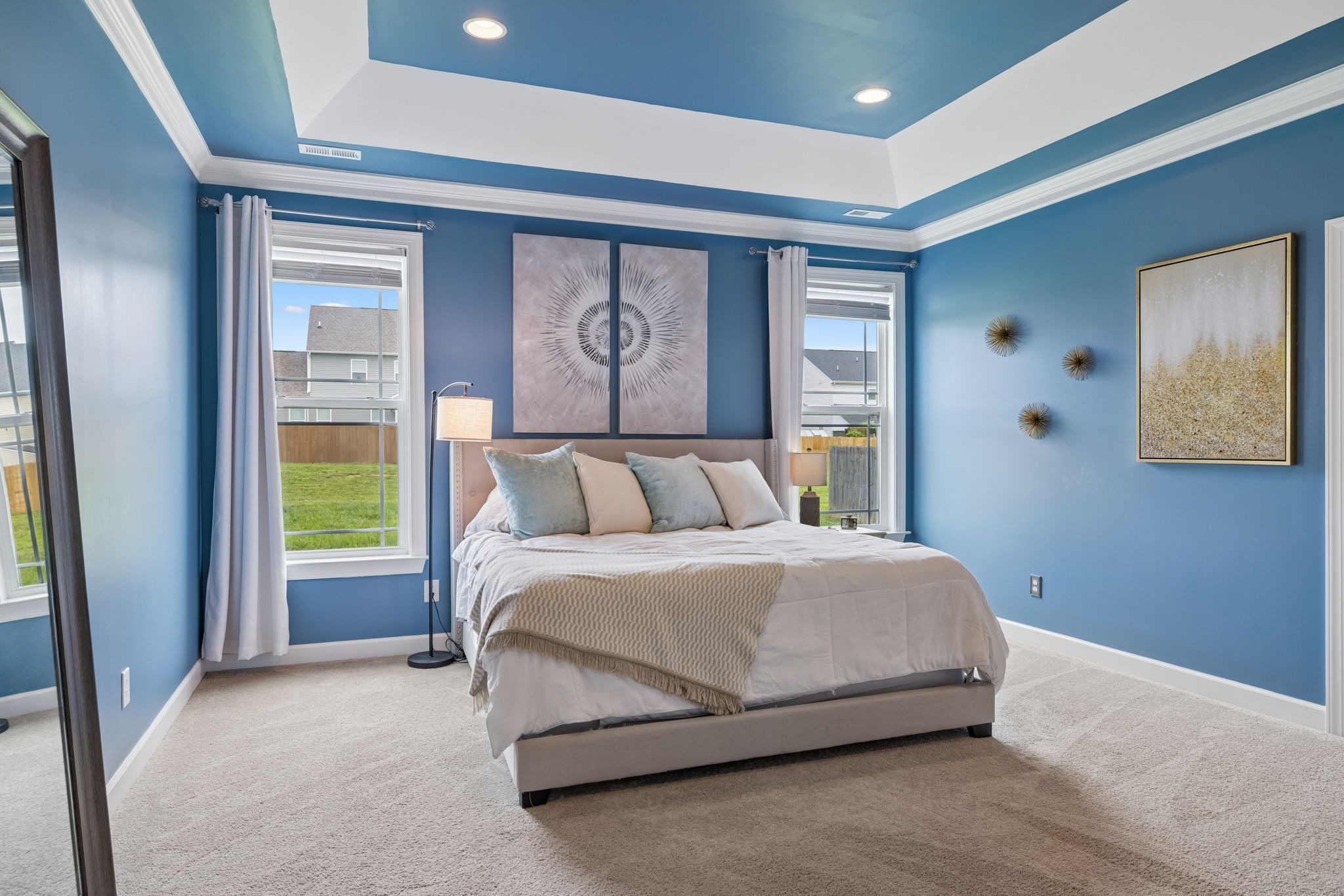1002 Garrison Way Spring Hill, TN 37174 - Photo 38 of 63 a bedroom with a bed and painting on the wall