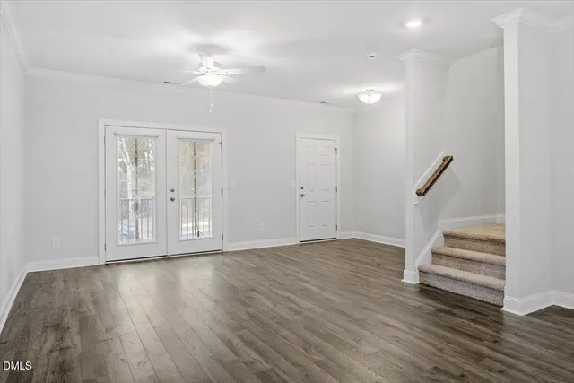 a view of entryway with wooden floor