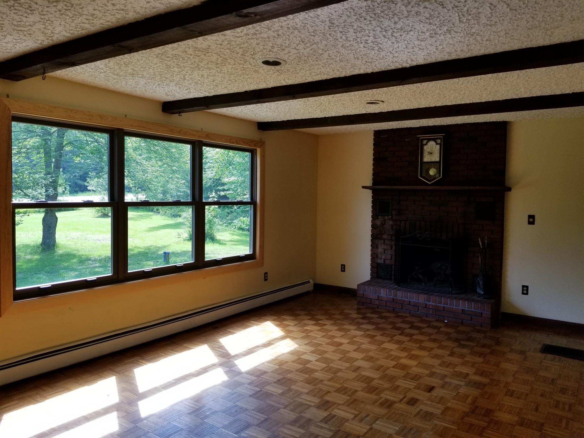 359 Norridgewock Road Fairfield, ME 04937 - Photo 13 of 37 Living Room with Fireplace