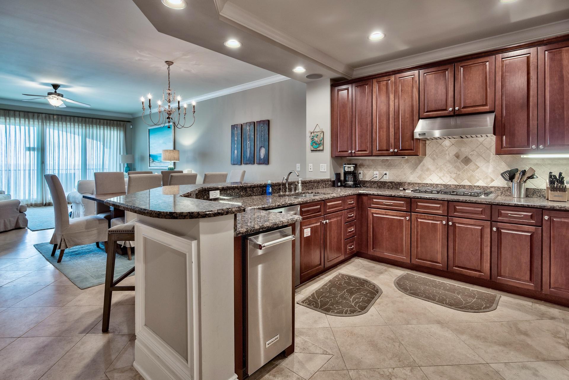 2421 West County Highway 30A, Unit C402 Santa Rosa Beach, FL 32459 - Photo 13 of 38 a kitchen with a sink cabinets and wooden floor