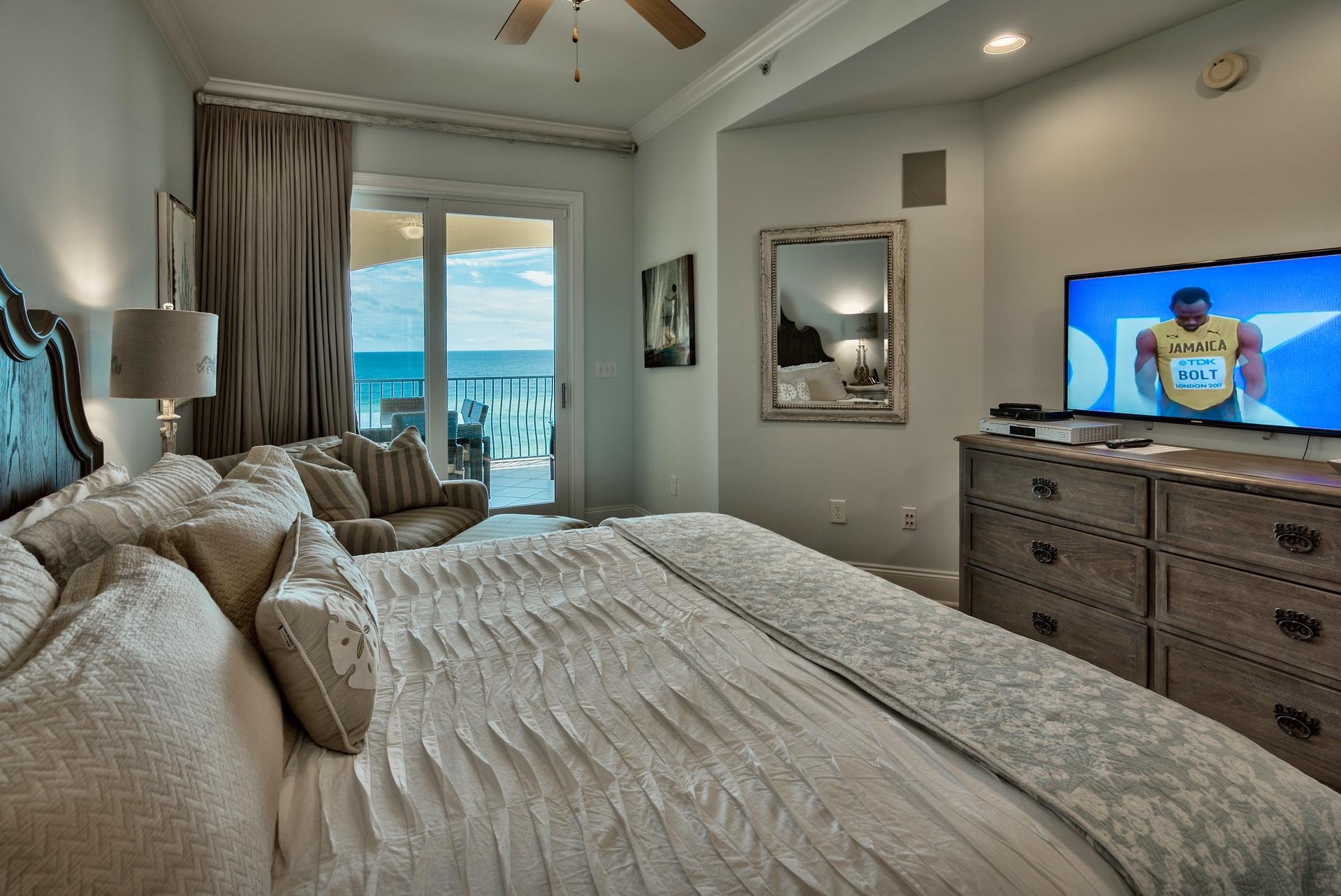 2421 West County Highway 30A, Unit C402 Santa Rosa Beach, FL 32459 - Photo 17 of 38 a bedroom with a bed and a painting on the wall