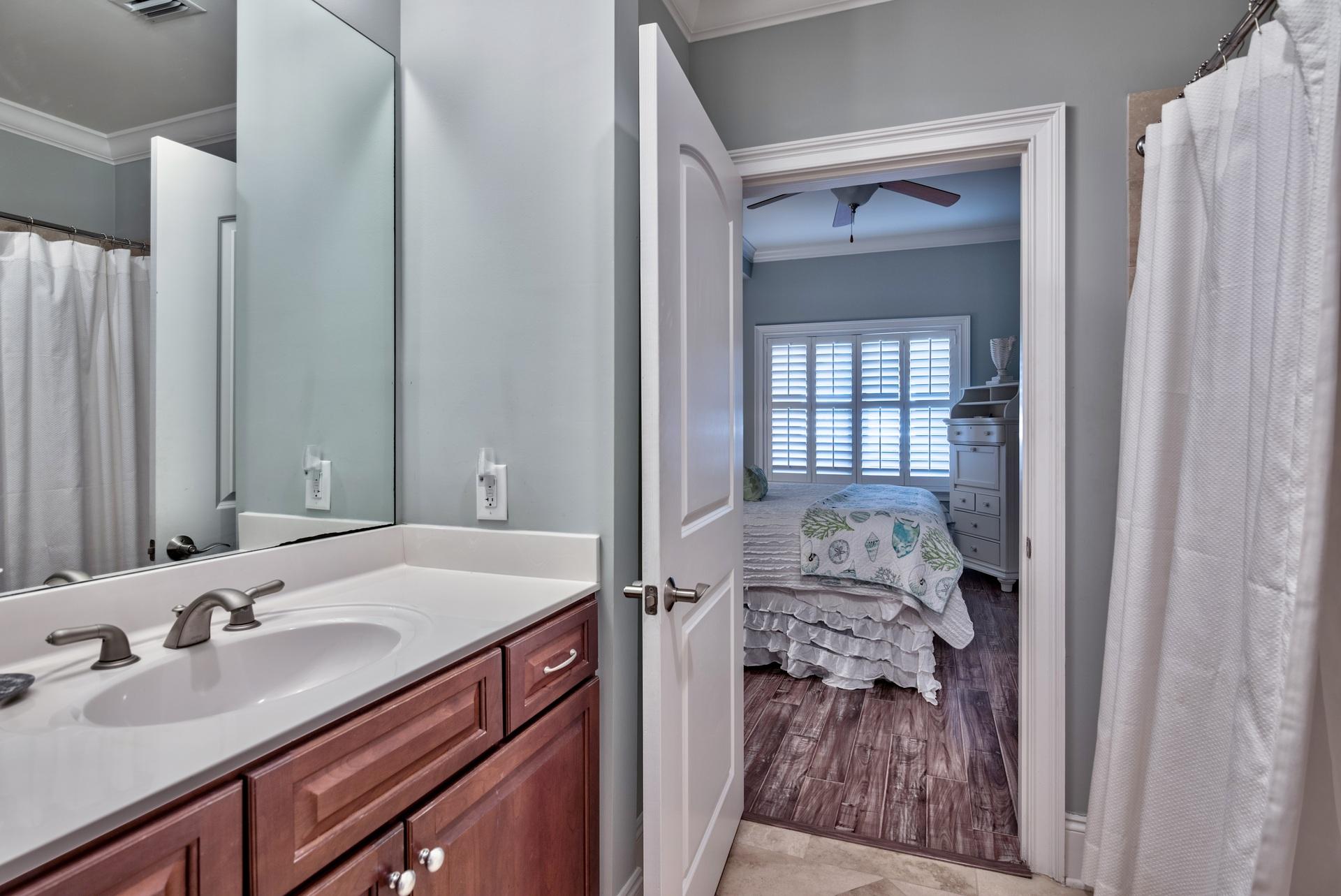2421 West County Highway 30A, Unit C402 Santa Rosa Beach, FL 32459 - Photo 21 of 38 a en suite bathroom with a sink and mirror