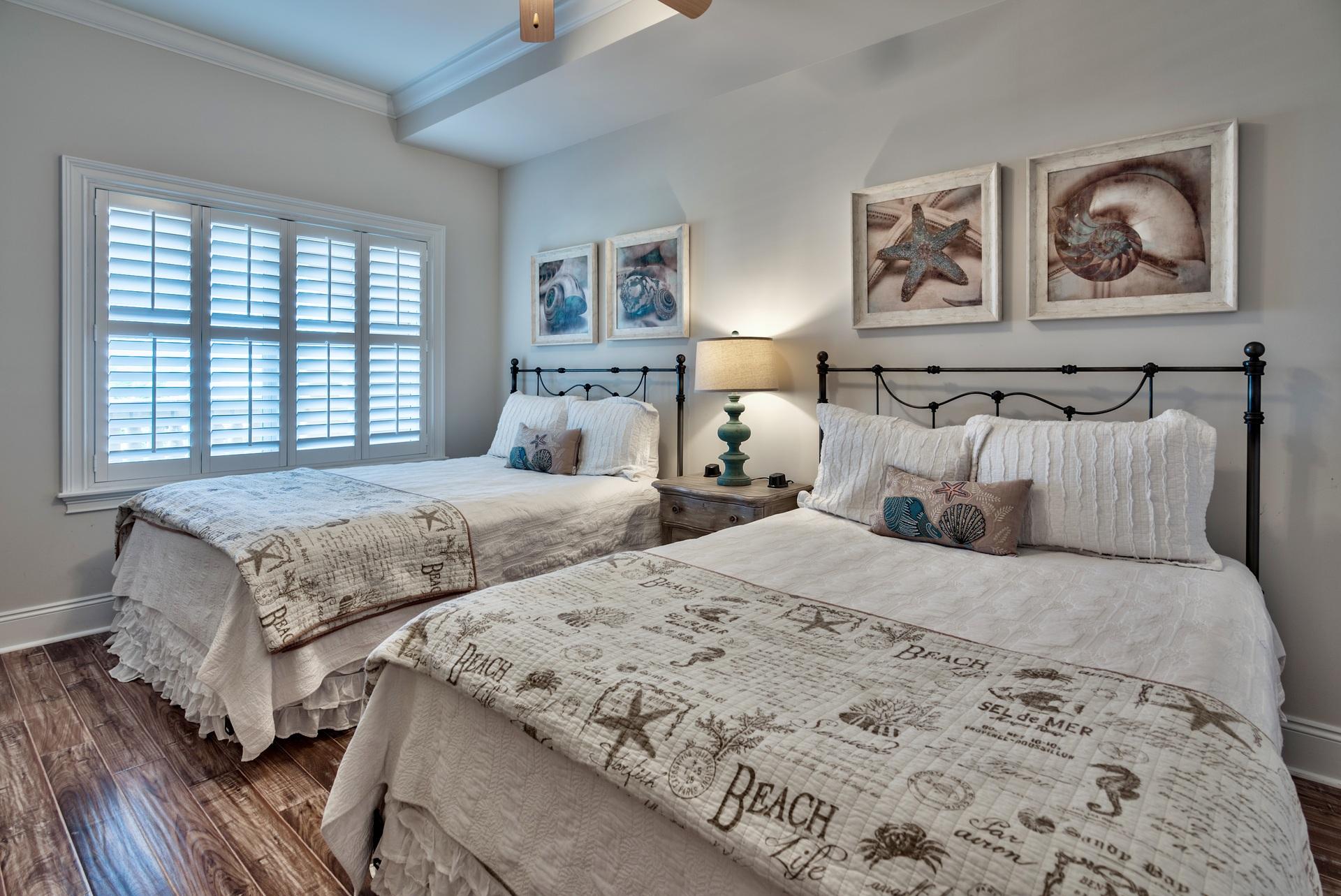 2421 West County Highway 30A, Unit C402 Santa Rosa Beach, FL 32459 - Photo 24 of 38 a bedroom with double bed and a window