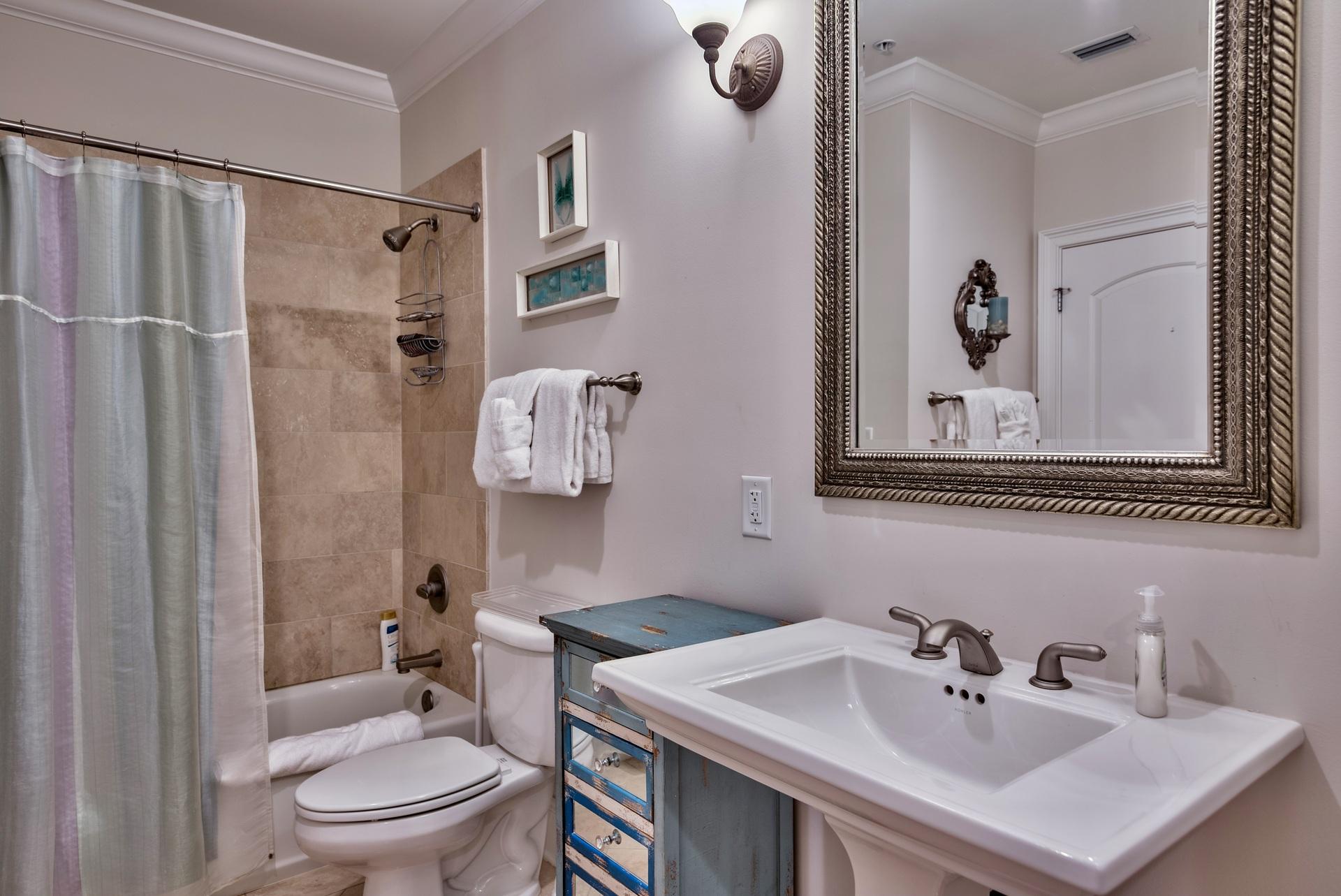 2421 West County Highway 30A, Unit C402 Santa Rosa Beach, FL 32459 - Photo 25 of 38 a bathroom with a sink toilet and shower