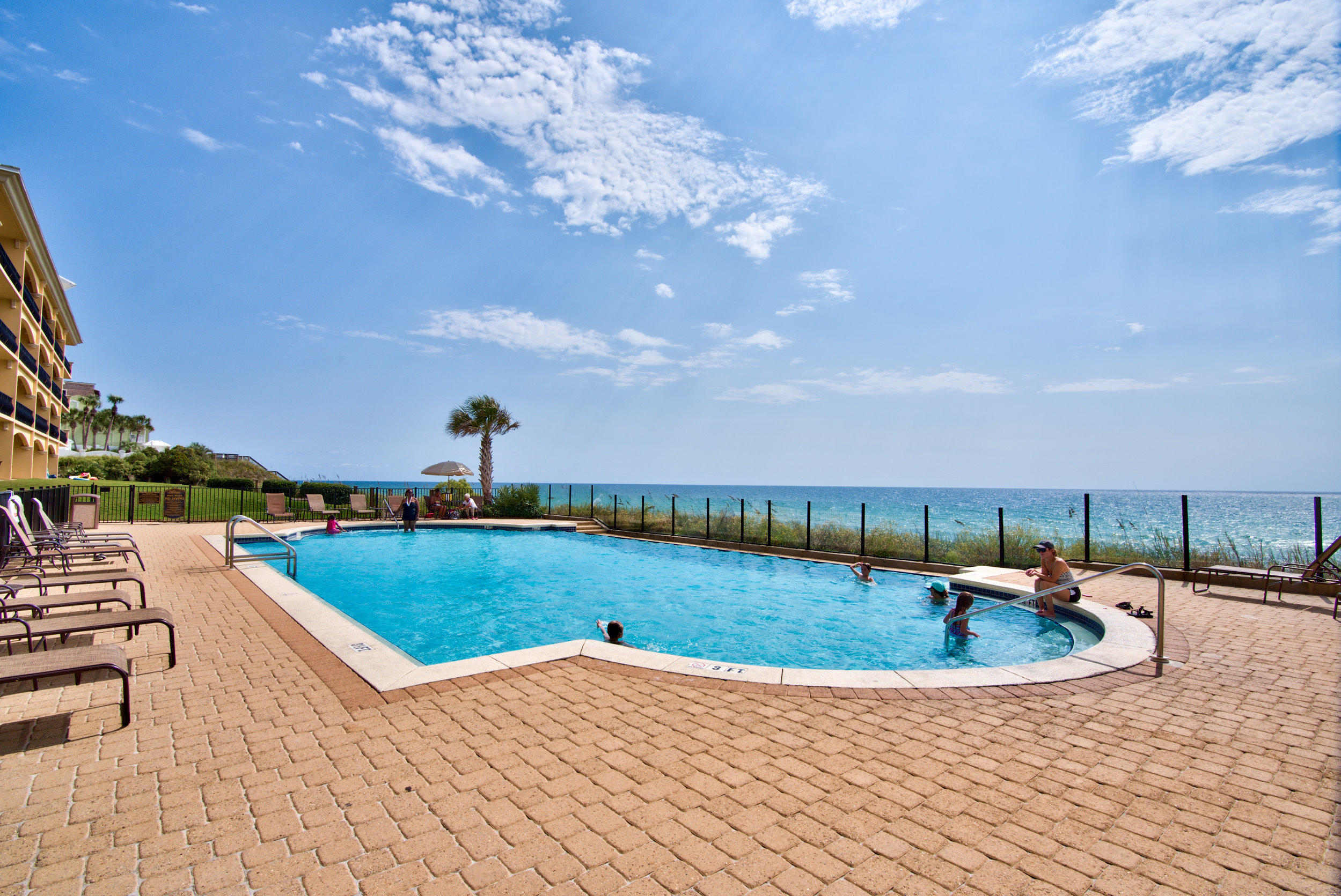 2421 West County Highway 30A, Unit C402 Santa Rosa Beach, FL 32459 - Photo 35 of 38 a view of a swimming pool with a patio