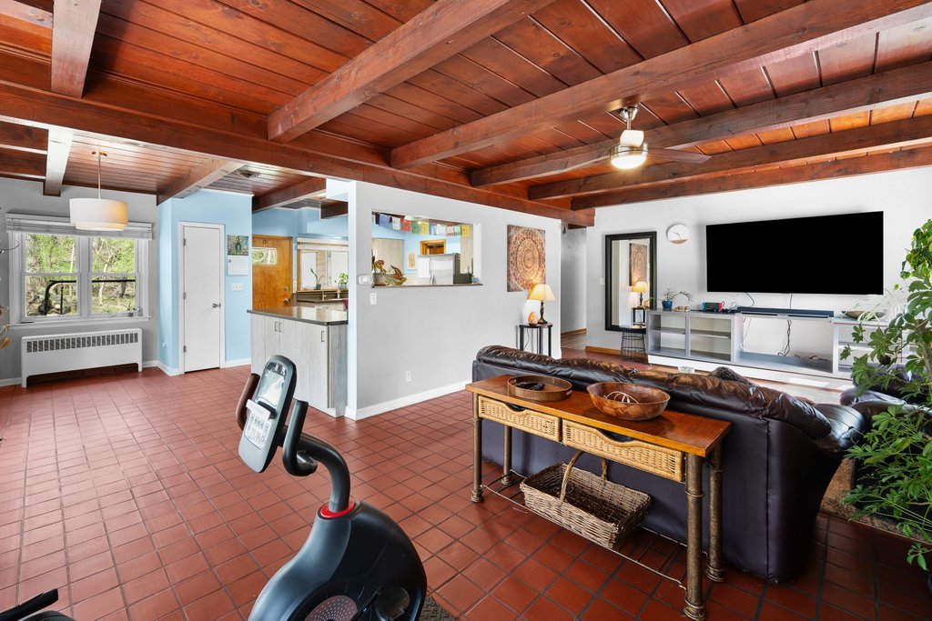 1031 27th Street Moline, IL 61265 - Photo 15 of 36 a view of a livingroom with furniture and a flat screen tv