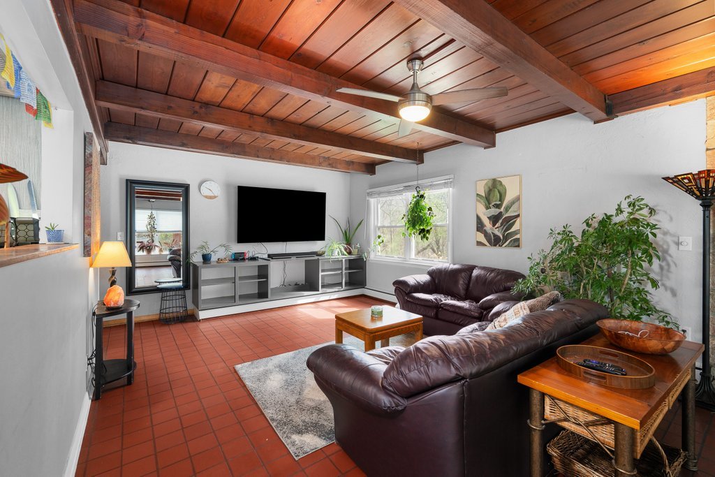 1031 27th Street Moline, IL 61265 - Photo 16 of 36 a living room with furniture and a flat screen tv