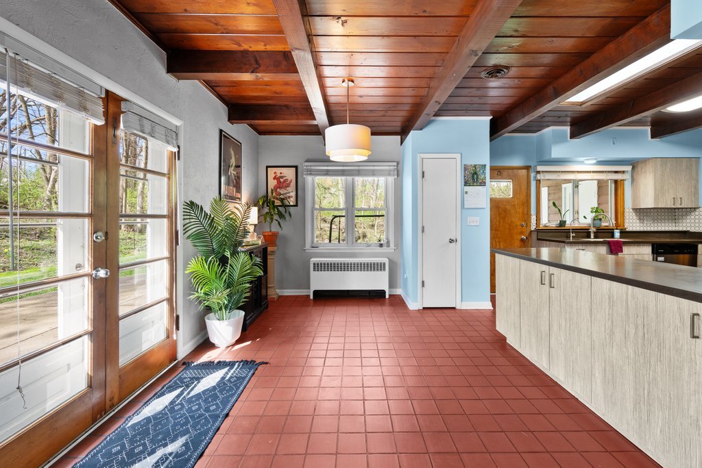 1031 27th Street Moline, IL 61265 - Photo 18 of 36 a view of entryway with window and front door