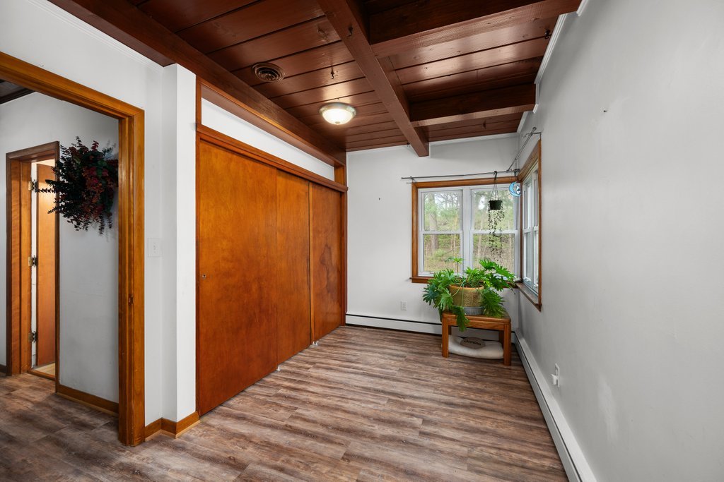 1031 27th Street Moline, IL 61265 - Photo 27 of 36 a view of entryway with wooden floor and stairs