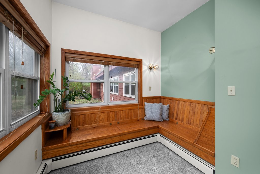 1031 27th Street Moline, IL 61265 - Photo 32 of 36 a sitting area with wooden floors and a couch