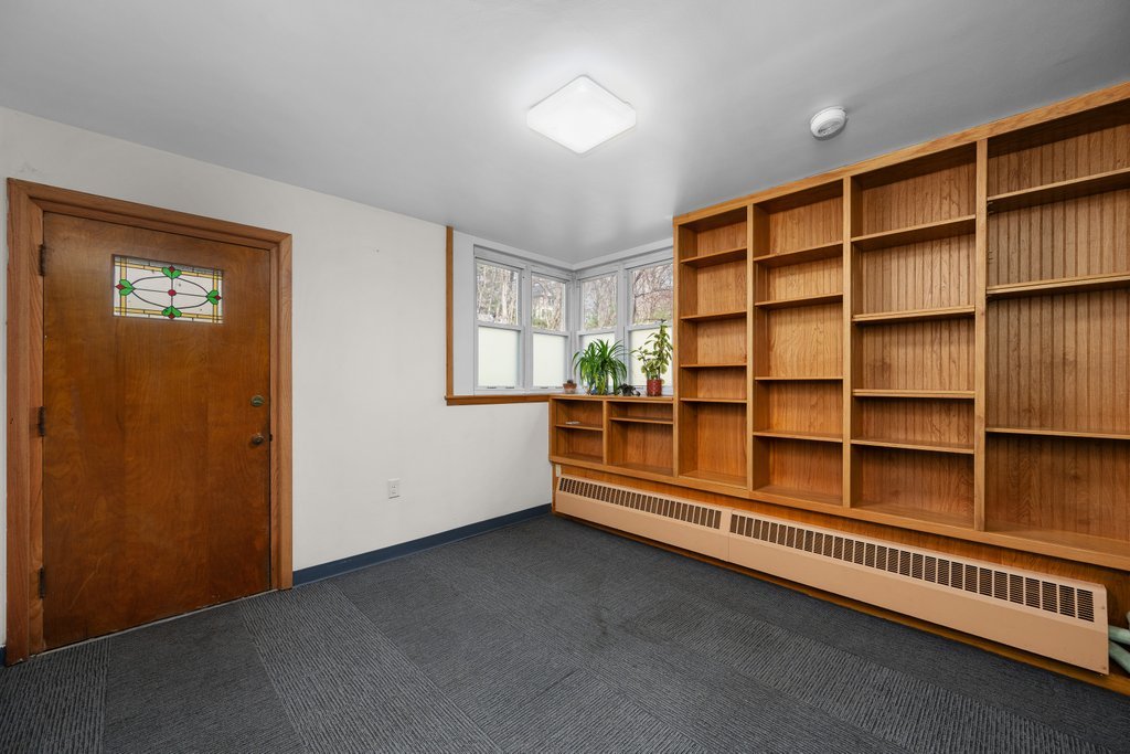 1031 27th Street Moline, IL 61265 - Photo 35 of 36 a view of an empty room with shelves