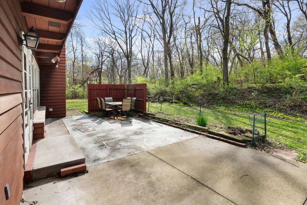 1031 27th Street Moline, IL 61265 - Photo 9 of 36 a view of backyard with trampoline