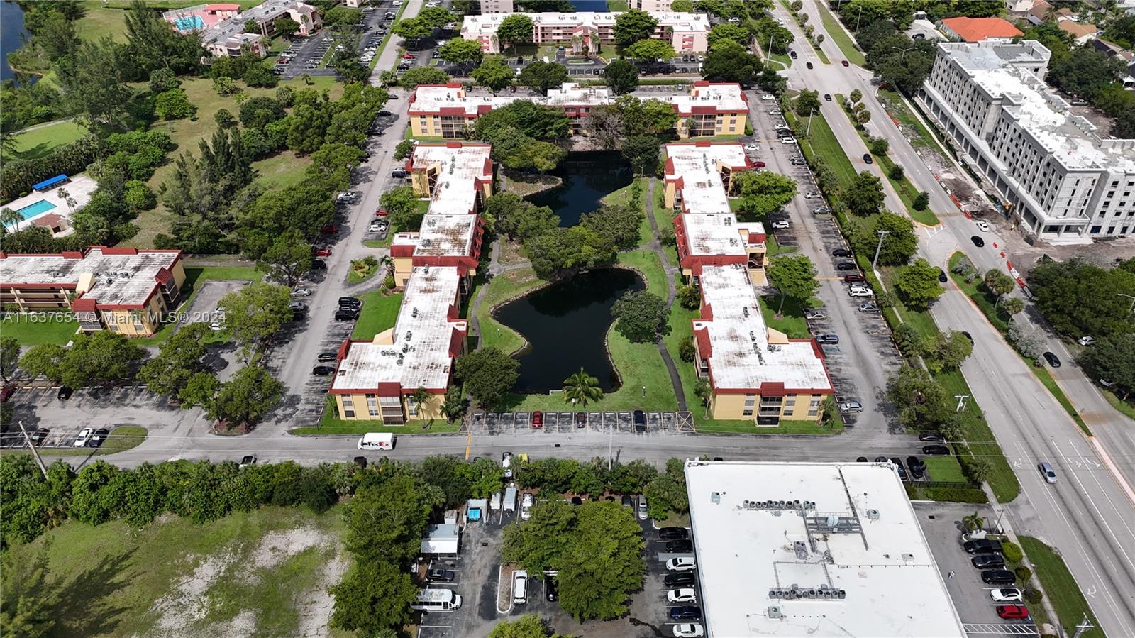 3195 Foxcroft Road, Unit F205 Miramar, FL 33025 - Photo 11 of 17 an aerial view of residential houses with outdoor space