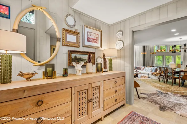 a bedroom with bed and window