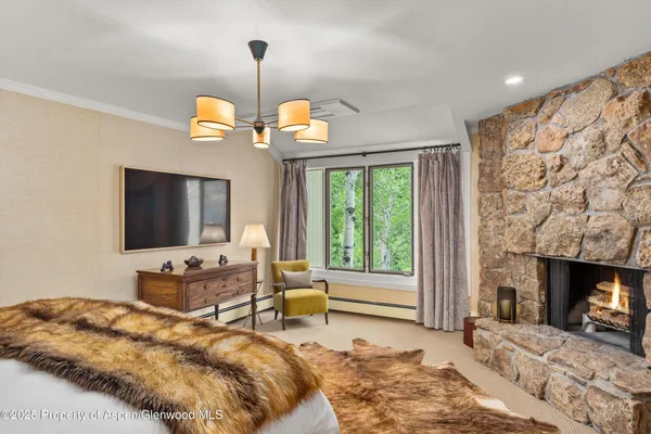 a bathroom with a bathtub a sink and a mirror