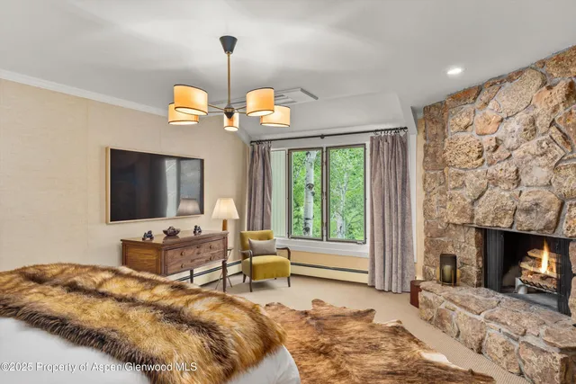 a bathroom with a bathtub a sink and a mirror