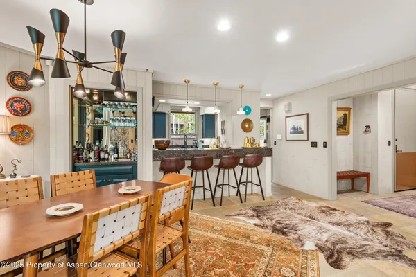 a living room with a couch and a table