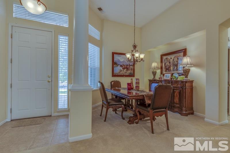 9960 Moccasin Court Reno, NV 89521 - Photo 3 of 20 a view of a dining room with furniture