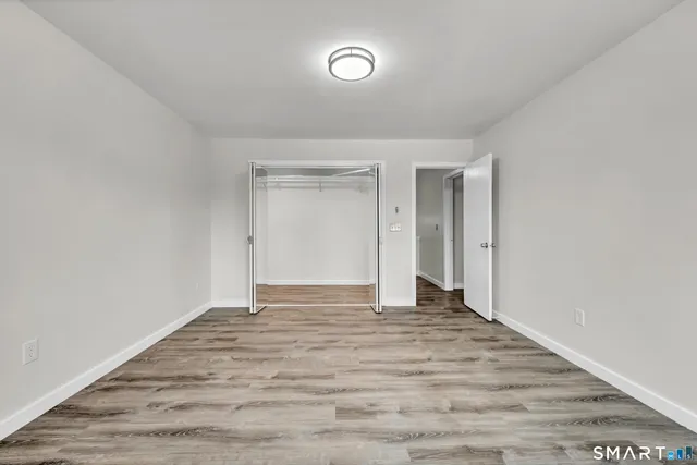 a bathroom with a toilet and a sink