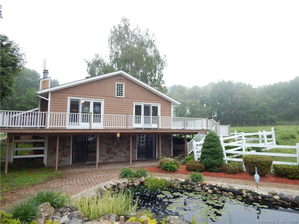 245 Church Road Lebanon, CT 06249 - Photo 1 of 1 a front view of a house with garden