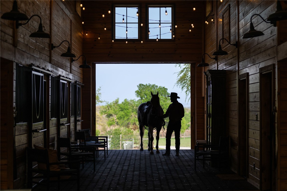 _ Prominence Road Spicewood, TX 78669 - Photo 23 of 26 a view of balcony and wooden floor