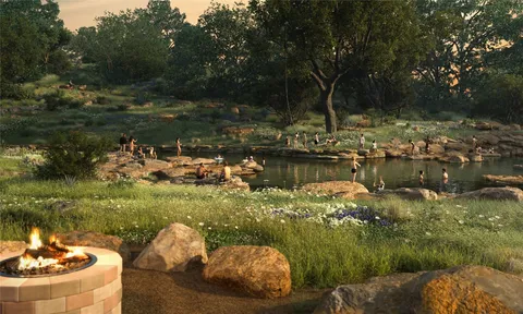 a view of a lake with lawn chairs