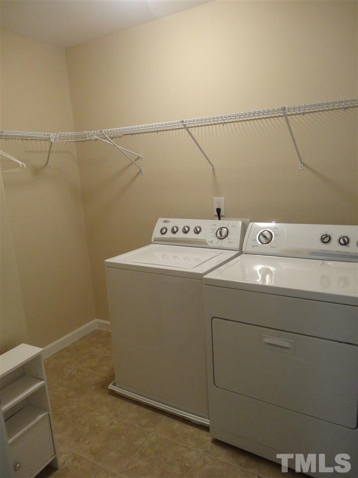 6835 Horseback Lane Raleigh, NC 27610 - Photo 22 of 25 a utility room with dryer and washer