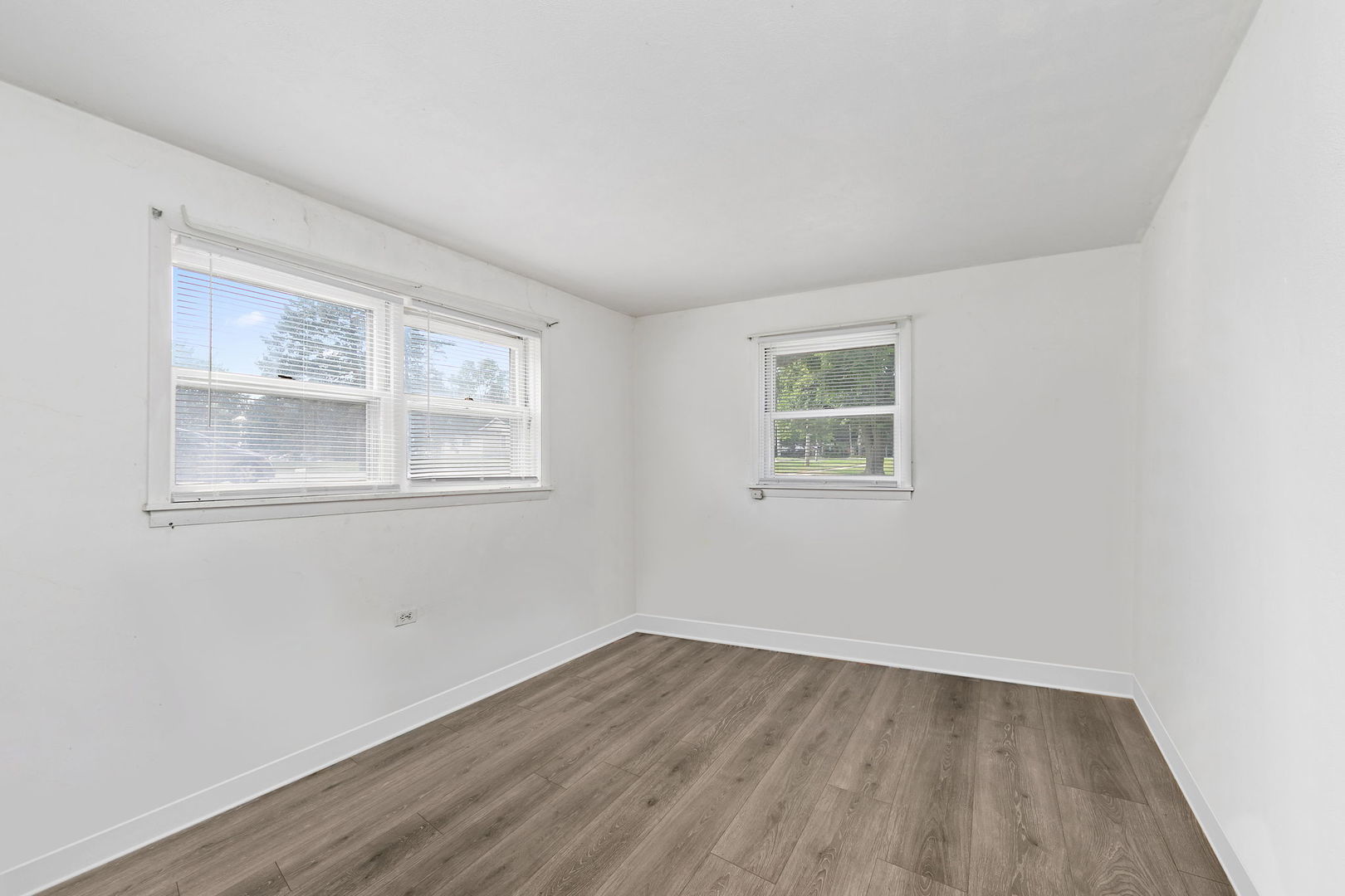 104 High Avenue, Unit C Hampshire, IL 60140 - Photo 14 of 22 an empty room with a window