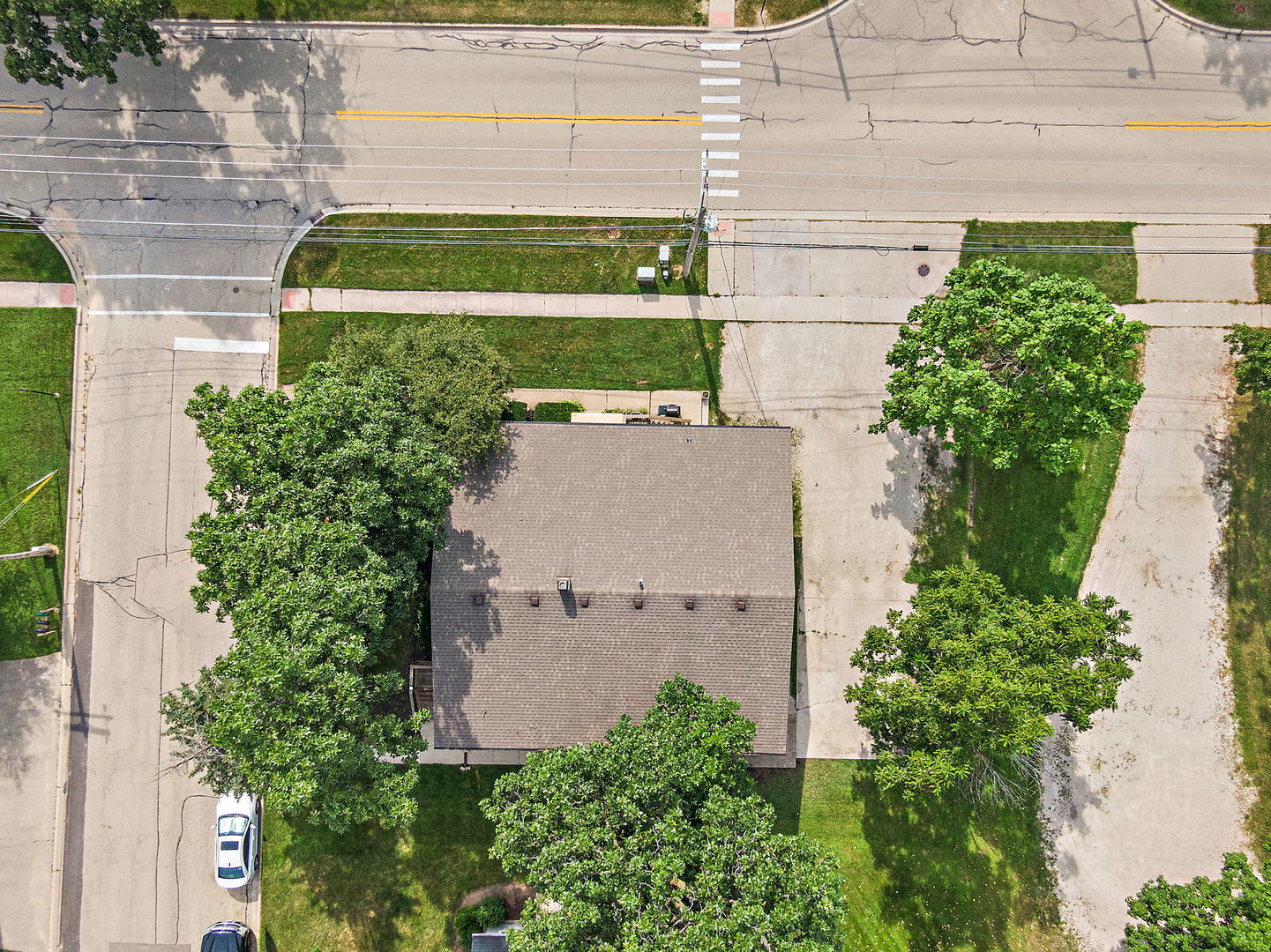 104 High Avenue, Unit C Hampshire, IL 60140 - Photo 19 of 22 an aerial view of a house with a yard