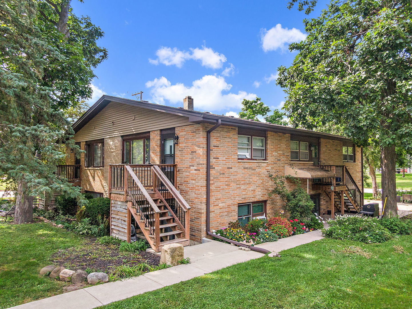104 High Avenue, Unit C Hampshire, IL 60140 - Photo 22 of 22 a view of a house with a yard