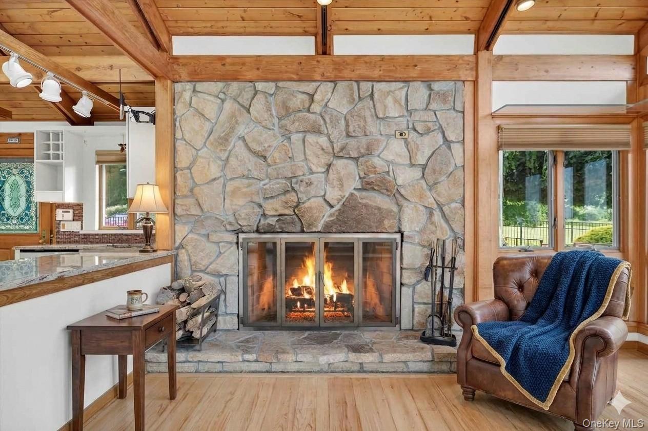 165 Hasbrouck Road Goshen, NY 10924 - Photo 23 of 50 Rustic woodburning stone fireplace keeps the home warm and cozy on chilly winter days*virtually staged*