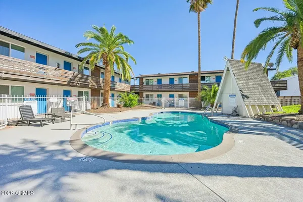 a view of a house with a swimming pool