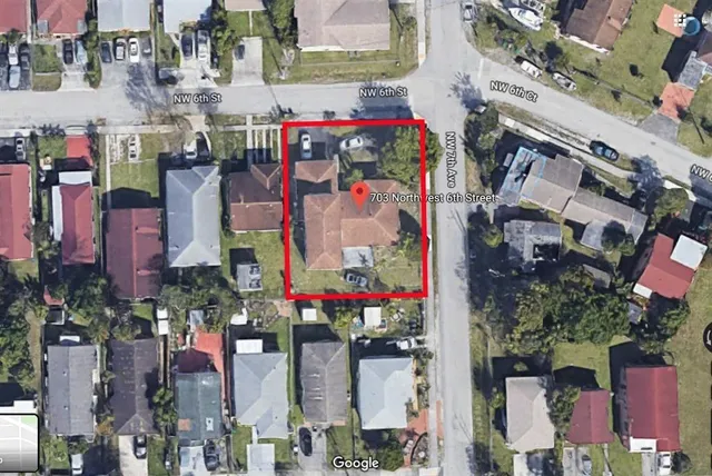 a kitchen with a stove and a refrigerator