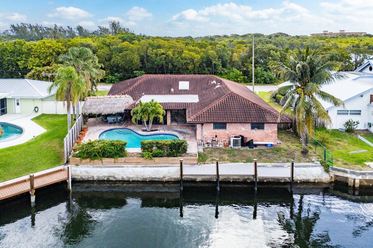 3163 Northeast 8th Avenue Boca Raton, FL 33431 - Photo 3 of 17 an aerial view of house with yard