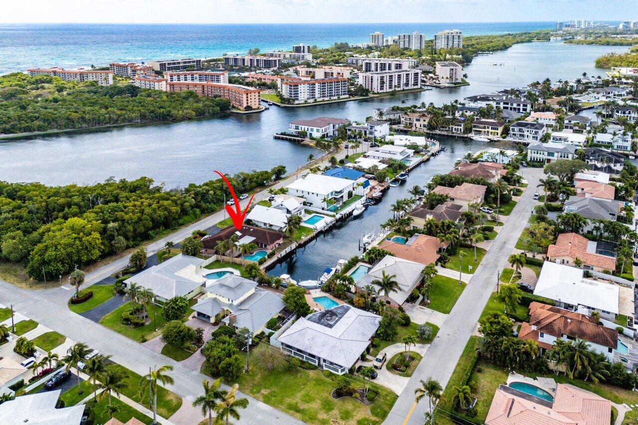 3163 Northeast 8th Avenue Boca Raton, FL 33431 - Photo 4 of 17 an aerial view of residential houses with outdoor space