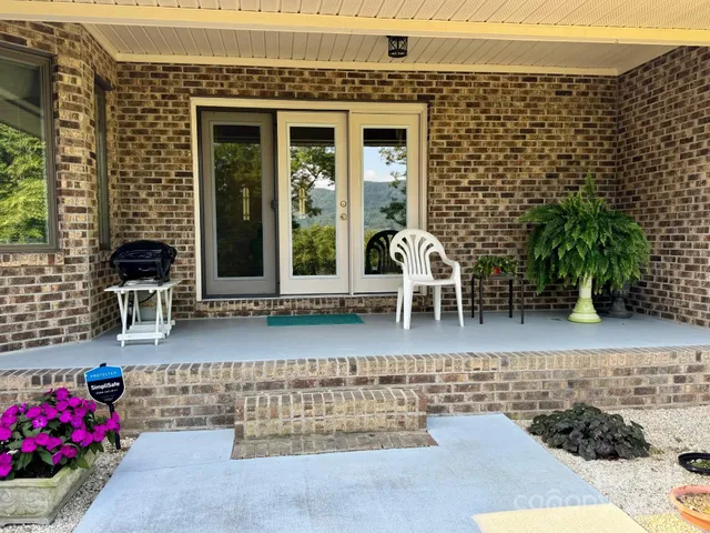 front view of a brick building with many windows