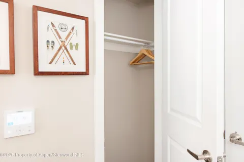 a view of a bathroom with a tub and shower