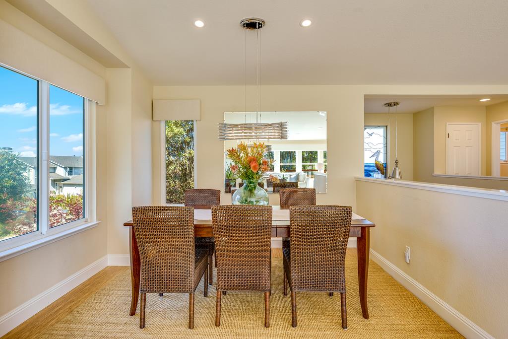 425 Canon Del Sol La Selva Beach, CA 95076 - Photo 11 of 59 a view of a dining room with furniture and wooden floor