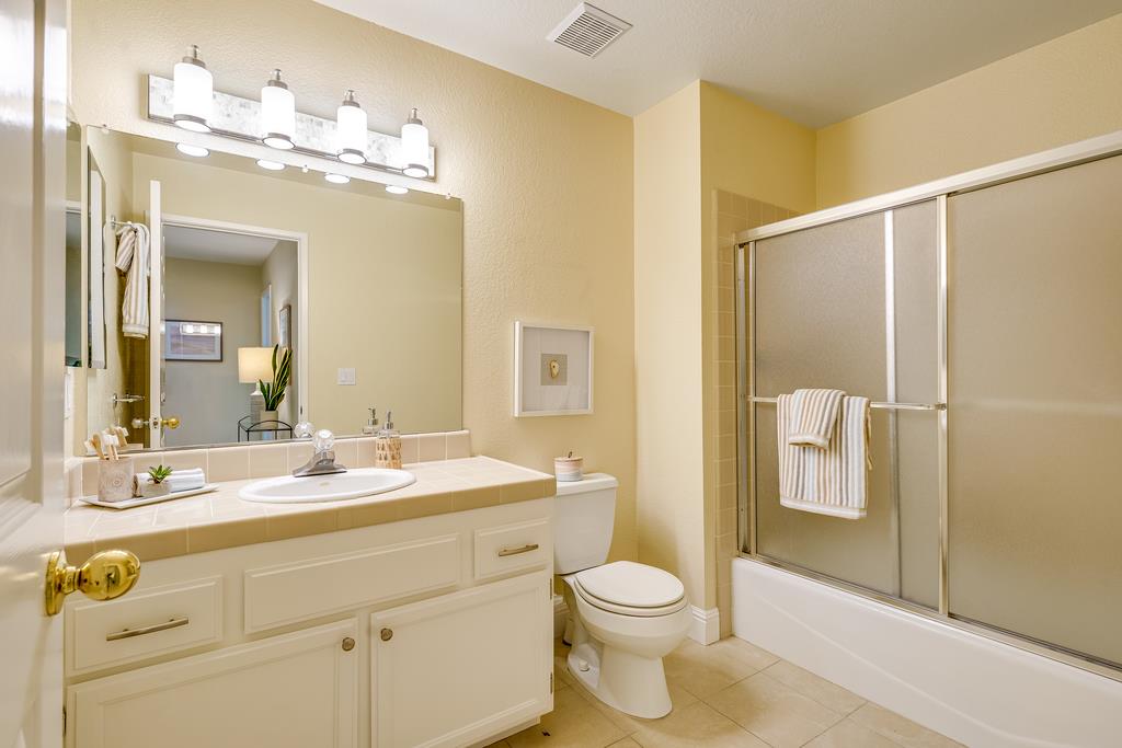 425 Canon Del Sol La Selva Beach, CA 95076 - Photo 21 of 59 a bathroom with a sink a toilet and shower